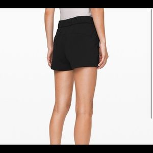 Size 12 on the fly shorts. Brand new with tags